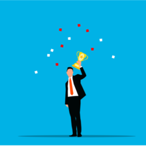Businessman holding trophy